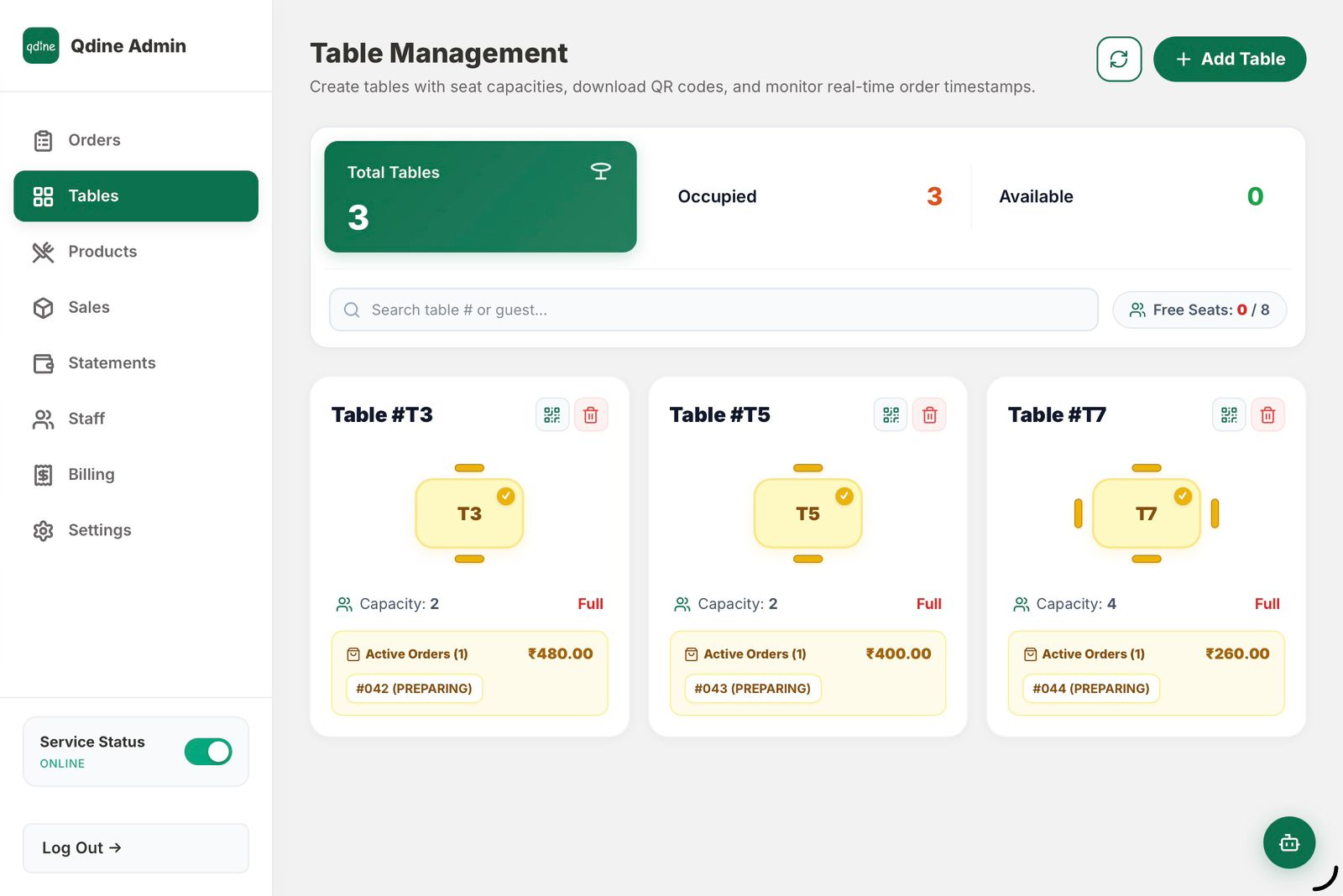 Qdine Table Management showing occupied and available tables with real-time order tracking and seat capacity management